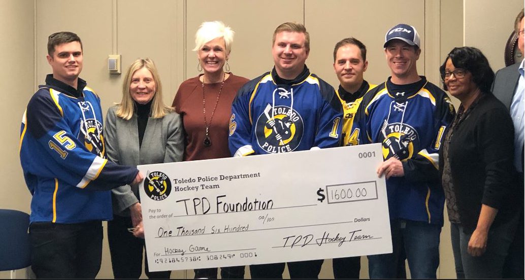 TPD Hockey Team Donates proceeds to Toledo Police Foundation